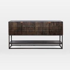 the sideboard is made out of wicker and metal