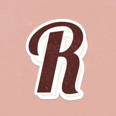 the letter r is made up of brown and white stickers on a pink background