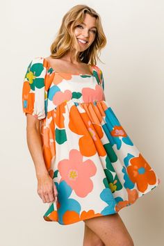 The Floral Puff Sleeve Mini Dress is a charming and trendy choice for a feminine and whimsical look. Adorned with a lovely floral print and puff sleeves, this dress exudes a romantic and playful vibe. The mini length adds a flirty touch, perfect for a fun and stylish outfit. Made from lightweight and flowy fabric, it ensures comfort and ease of movement. Pair it with sandals for a casual daytime look or dress it up with heels for a special occasion. Elevate your wardrobe with this delightful Flo Dresses For Beach Vacation, Womens Flowy Dresses, Dresses For Beach, Daily Dresses, Flowy Summer Dresses, Puff Sleeve Mini Dress, Flowy Fabric, Baby Doll Dress, Square Neck Dress