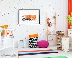 a child's room decorated in white, yellow and black with colorful polka dots on the wall