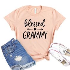 a t - shirt that says,'besed granny'with an arrow on it