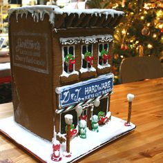 a gingerbread house is decorated for christmas