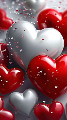 many red and white hearts floating in the air