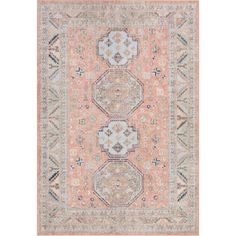 an orange, blue and beige rug with geometric designs on the bottom half of it