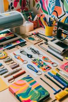 the table is covered with various art supplies