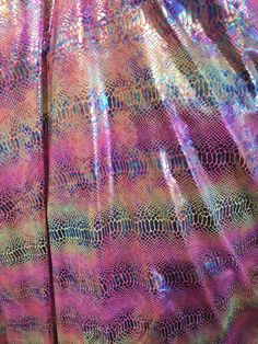 This 2-way stretch fabric is 80% Nylon and 20% Spandex with a 2-way stretch. It features a reflective and shimmering snake skin scale print. This snake print are Ideal for costumes, dresses, leggings, clothing, nightgowns ,prom dresses, swim suits, interior décor and much more.. 2-ways stretch Lycra-Spandex. Width:58-60 inches. Length:36 inches- each yard. This item is also available in increments of more than one yard in one piece. Dear costumer the shipping of you item may take 3-5 days do to Scale Skin, Costumes Dresses, Iridescent Green, Swim Suits, Stretch Velvet, Nightgowns, 2 Way, Beaded Lace, Tie Dyed