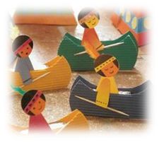 children are playing with paper boats on the floor