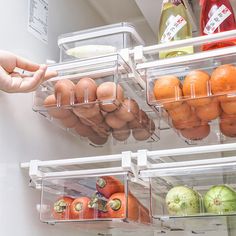 an open refrigerator filled with lots of different types of fruit and veggies on shelves