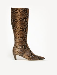 Crafted from soft, python-printed leather, The Tina features an on-trend kitten heel and a sleek pointed toe (protected by an extended rubber insert on the sole). A marriage of timeless design, high-quality materials, and masterful workmanship, this outfit-making, knee-high boot will last for years with the right care. Elegant Leather Snake Print Boots, Embossed Boots, Heel Boots For Women, Snake Print Boots, Kitten Heel Boots, Trending Boots, Python Print, Boot Print, How To Stretch Boots