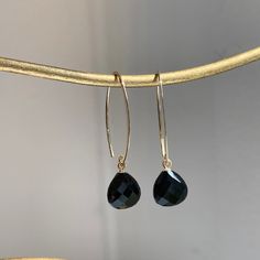 14KT yellow gold genuine black onyx teardrop earrings. Charming, teardrop black onyx, finished on all sides dangle on curved, V shape ear wire. Earring Measures: 1.50" x.60" Weight: 1.07 grams 10mm Checkerboard Faceted Onyx Curved 14KT Ear Wires Black Drop Jewelry, Modern Black Jewelry With Ear Wire, Black Teardrop Modern Jewelry, Classic Black Drop Jewelry, Modern Black Teardrop Jewelry, Elegant Black French Hook Earrings, Modern Black Long Drop Jewelry, Black Drop Jewelry With Pierced Details, Black Drop Earrings With French Hook