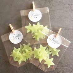 four star shaped candles sitting on top of each other