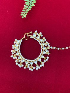 Luxury bridal nose ring. 24k gold plated , brass made kundan nose ring. For non pierced nose or pierced nose. Very light weight. About 1.5 inch diameter. Nath Nose Ring, Bridal Nose Ring, Pierced Nose, Bengali Bride, Ring Emerald, Luxury Bridal, Nose Piercing, Gold Pearl, Green And Gold