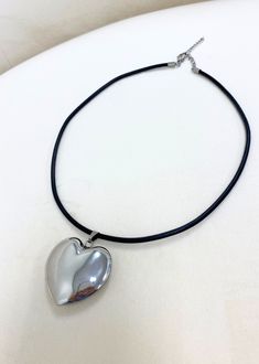 Be on trend with this chunky silver heart necklace, it will spice up any outfit! The Details Stainless Steel Pendant Adjustable Felt Chain For Best Results, Do Not Wear In Shower Or Get Product Wet Trendy Silver Heart Pendant Necklace, Trendy Silver Necklace With Heart Pendant, Trendy Silver Open Heart Necklace, Chunky Heart Pendant Necklace For Valentine's Day, Chunky Heart Pendant Necklace As Gift, Chunky Heart Necklace For Valentine's Day, Trendy Silver Heart Necklace For Valentine's Day, Chunky Metal Heart Pendant Necklace, Chunky Metal Necklace With Heart Pendant