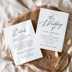 two wedding programs on a wooden platter