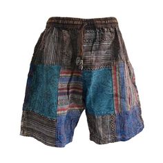 Unisex handsewn patchwork shorts made in Nepal. These high quality shorts are thicker and more durable than your standard cotton shorts. Features:  - As these are handmade the locations of the patches may vary. However, the general colour will remain the same. - Elastic waist with a draw string - 2 side pockets - 1 back pocket Sizes:  *As these are handmade these dimensions may vary slightly M: *        Elastic waist: 68-106cm *        Outseam: 51cm *        Inseam: 21cm L: *        Elastic wais Patchwork Short Bottoms For Festival, Hippie Style Bottoms With Built-in Shorts, Bohemian Patchwork Shorts, Hippie Patchwork Shorts For Festival, Hippie Style Patchwork Shorts, Summer Festival Shorts With Patchwork, Bohemian Shorts With Pockets, Blue Cotton Festival Shorts, Multicolor Patchwork Cotton Shorts