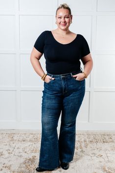 Flaunt your fashion-forward style with Edna's High Rise Control Top Shield Pocket Flare Jeans! The slimming tummy control tech and dark wash make for a flattering silhouette, while the raw hem and shield pocket add a unique twist. Say goodbye to boring denim and hello to playful fashion! Playful Fashion, Fly Control, Judy Blue Jeans, Denim Leggings, Romper Dress, Dress Romper, Flare Jeans, Vest Jacket, Sweater Top