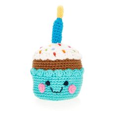 a crocheted cupcake with a candle in it's center, on a white background