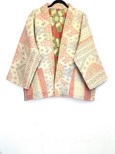 Vintage Kantha Jacket, Indian Patchwork Kantha Quilt Coat, Cotton Kantha Jacket, Kantha Long Jacket, Unisex Coat, Winter Wear Jacket, Ethnic Bohemian Jacket, Festival Fashion Kantha Coat, Gift For Her, Ladies Short Kantha Jacket, Kantha Reversible Short Length Spring Bolero Bohemian jacket Beautiful handcrafted reversible kantha cotton jacket is made with layers of recycled sari cloth. It has easy fitting with two big patch pockets on front sides of the jacket. Vintage Sari piping detail all ove Bohemian Pink Outerwear With Pockets, Pink Bohemian Outerwear With Pockets, Traditional Multicolor Outerwear With Pockets, Red Bohemian Outerwear With Pockets, Festival Mode, Open Coat, Short Long Dresses, Bohemian Jackets, Quilt Coat