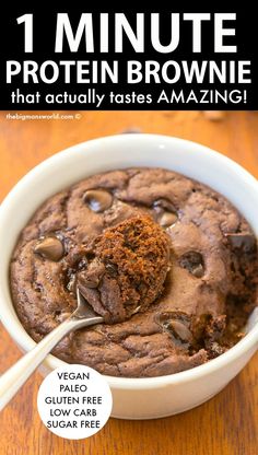 a close up of a spoon in a bowl of chocolate chip cookie mug brownie