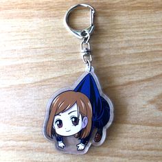 a key chain with an anime character on it