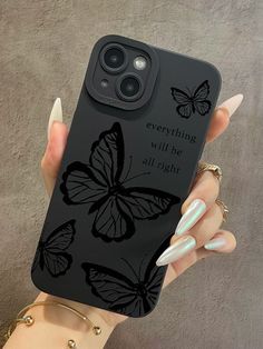 a woman's hand holding an iphone case with butterflies on it and the words everything will be all right