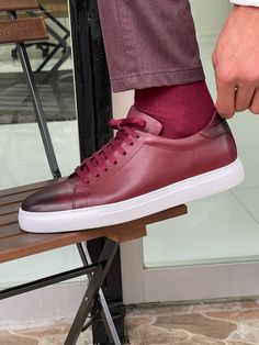 NEW COLLECTİON - FW 21 / 22 Collection: FALL & WİNTER 21 - 22 Production: Special Production Eva Sole Lace-Up Leather Sneakers Claret-red Product color: CLARET-REDProduct material: %100 Leather Product care: Care with a shoe eraser.Product size: 39-40-41-42-43-44-45Package İncluded: Shoes Dimensions of the mannequin: 185cm / 78kg , Size : 44EU / 11US / 10UK Note : When you buy shoes, claret-red belt and socks are a gift. Red Leather Sneakers For Light Sports, Modern Leather Sneakers With Red Sole, Red Leather Sneakers With Textured Sole, Luxury Semi-formal Men's Shoes With Red Sole, Red Leather Fade-resistant Sneakers, Claret Red, Red Belt, Mid Top Sneakers, Burgundy Lace