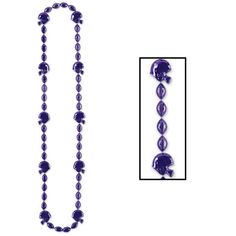 a long beaded necklace with purple beads and an image of a fish on it