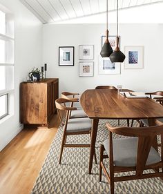 an iphone photo of a dining room table and chairs