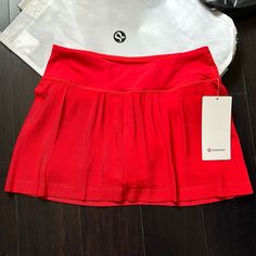 Brand New With Tags Lululemon Pleat To Street Skirt Color Hot Heat Size 4 Completely Sold Out! Guaranteed Authentic Reasonable Offers Only Please And Thank You N829 Casual Red Skort For Sports, Sporty Red Fitted Skirt, Sporty Red Skirt For Spring, Red Casual Skort For Sports, Red Sports Skort For Summer, Sporty Red Tennis Skirt For Summer, Sporty Red Skort For Sports, Casual Red Sports Skort, Red Casual Sports Skort