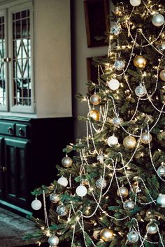 a decorated christmas tree in a living room