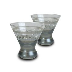 two glass cups sitting on top of each other