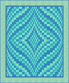 a blue and green quilt with squares on it