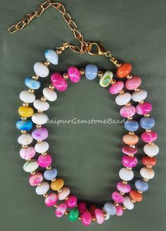 Stone Name = Disco Opal Shape = Rondelle Size = 7-8 mm Approx Style = Smooth Type = Gemstone Drill = Center ( Sizes And Measurement Are Approximations....) www.etsy.com/in-en/shop/JaipurGemstoneBeads1 Customer Satisfaction Is Our Main Priority.... Thank You For Shopping Adjustable Multicolor Crystal Necklace With 8mm Beads, Faceted Oval Beads For Gifts, Handmade Heishi Oval Beads, Agate Beaded Crystal Necklaces With Round Beads, Handmade Oval Heishi Beads, Beaded Agate Crystal Necklaces With Round Beads, Multicolor Agate Crystal Necklace With Faceted Beads, Agate Beaded Crystal Necklaces, Multicolor Czech Glass Gemstone Beads