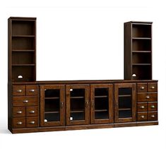 a large wooden entertainment center with drawers and doors on both sides, in front of a white background