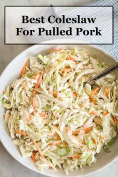 a white bowl filled with coleslaw and carrots