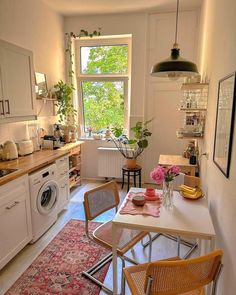 the kitchen is clean and ready to be used for cooking or dining room purposess