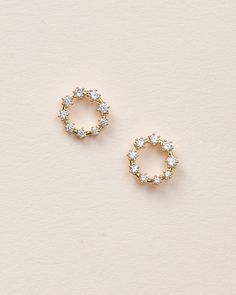 "SAYLOR CZ CIRCLE STUDS  Dainty & minimalist, our Saylor CZ Circle Stud Earrings  are the perfect way to add understated sparkle to any look. Designed with sterling silver or 18kt gold in a front facing hoop accented with CZ stones, you'll never want to take off these earrings. DETAILS * Sterling silver, 18 karat gold plated * Cubic zirconia * 0.3\" diameter * Hypoallergenic, lead-free & nickel-free. SHOP MORE STYLES https://www.etsy.com/shop/darethcolburndesigns NEED MORE HELP? Happy to offer a Dainty Round Halo Earrings, Dainty Round Halo Design Earrings, Delicate Round Cubic Zirconia Earrings, Delicate Round Earrings With Prong Setting, Delicate Round Prong Set Earrings, Bridal Stud Earrings, Minimalist Stud Earrings, Bridal Earrings Studs, Small Stud Earrings