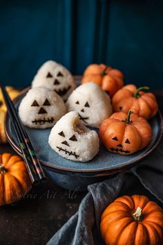 halloween treats on a plate with pumpkins and chopsticks