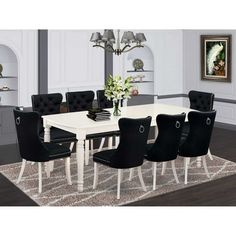 a white table with black chairs in a room