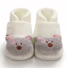 Baby Cartoon Magic Tape Warm Infant Shoes - PrettyKid Cute Non-slip Booties For Playtime, First Birthday Closed Toe Non-slip Booties, White Non-slip Booties With Round Toe, Playful Non-slip Booties With Round Toe, Playful Non-slip Round Toe Booties, Playful White Booties For Playtime, Cute White Booties With Soft Sole, Cute Closed Toe Booties For First Birthday, Non-slip White Booties For Babies