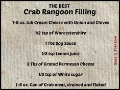 the best crab rangoon filling recipe is shown on a piece of parchment paper with red writing