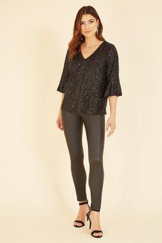 Perfect matched with skinny leather trousers, this all-over sequin detail black top comes in a relaxed, flattering fit, with statement fluted sleeves and a peep hole back fastening. Fluted Sleeves, Black Sequin Top, Petite Coat, Puff Sleeve Dresses, Cold Weather Outfits, Tops Black, Leather Trousers, Petite Tops, Sequin Top