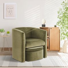 a green chair sitting on top of a white rug