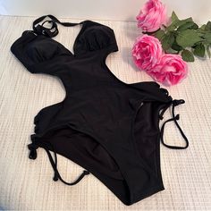 Women's Halter Black Cutout One Piece Swimsuit Mesh Monokini Bathing Suit Sz M Nwt Black Backless One-piece For Beach Season, Black One-piece Swimwear With Lined Body, Backless Black Swimwear For Summer, Black Backless Swimwear For Summer, Halter Neck Beachwear One Piece For Beach Party, Fitted Cutout One-piece For Sunbathing, Black One-piece Swimsuit For Sunbathing, Black Backless One Piece For Pool, Black Backless One-piece For Pool