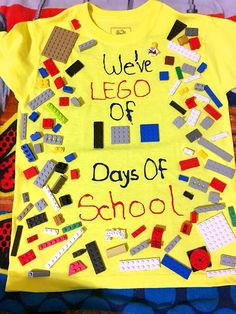 a yellow shirt with legos on it that says we've go of days of school