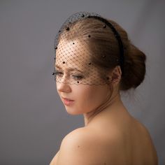 â Beaded birdcage veil features with narrow velvet headband and multi-sized glass beads. Black fascinator headband for wedding guest with bandeau veil is hand made and hand stitched. Short black veil for brides come with a scattering of multi-sized glass beads or without. â Velvet headband has been covered with bird cage veil giving the voilette a superior finish. The bridal veil in black falls below the nose.Please do visit this link below to see all the other modern hair accessories I offer:ht Short Black Veil, Bandeau Veil, Black Birdcage Veils, Wedding Guest Fascinators, Bird Cage Veil, Headband For Wedding, Veil Short, Bachelorette Veil, Wedding Hats For Guests