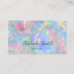 a business card with an abstract design on the front and bottom, featuring gold foil