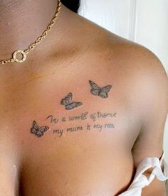 a woman's chest with two butterflies on it and the words to be written in cursive writing