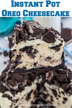 an oreo cheesecake is cut into pieces and served on a plate with a fork