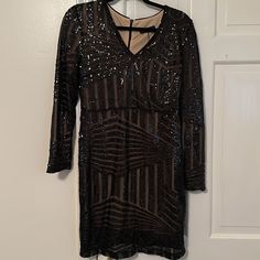 Black Sequin Bodycon Dress Size 8/10 Never Worn Black Sequin Long Sleeve Bodycon Dress, Black Long Sleeve Sequined Bodycon Dress, Black Sequin Knee-length Bodycon Dress, Black Bodycon Dress For Party, Black Sequin Bodycon Dress, Black Ribbed Dress, Ruffle Long Sleeve Dress, Plisse Dress, Grey Long Sleeve Dress